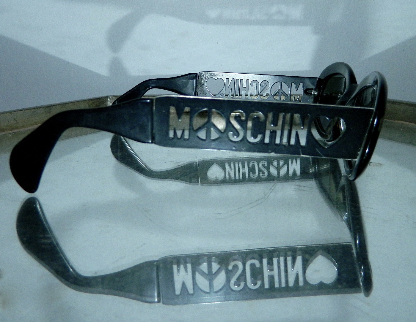 vintage 1990s MOSCHINO sunglasses cut out logo glasses frames black plastic